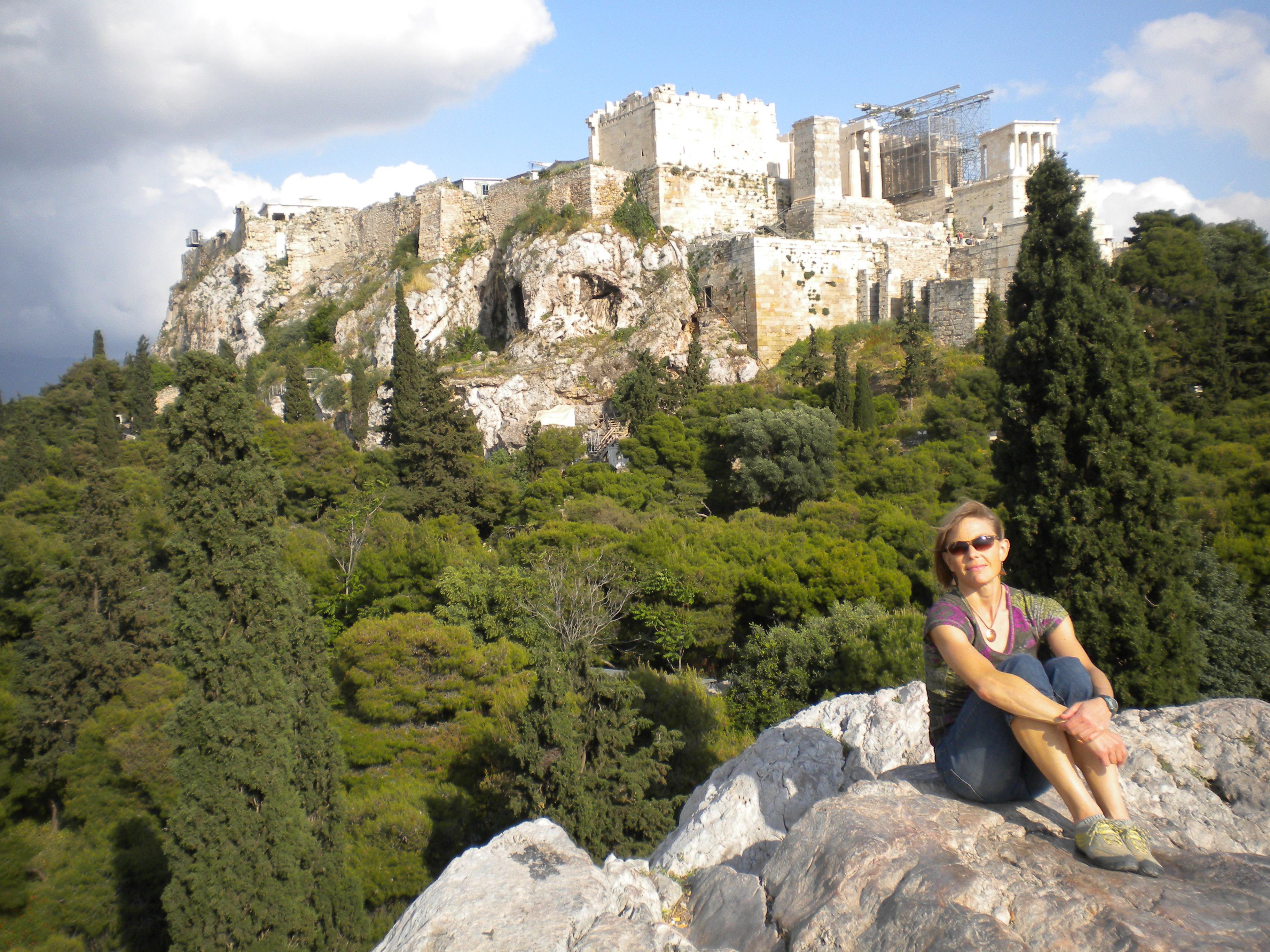 Sitting on Aeropagus ("Mars Hill") with the Acropolis and Parthenon in the background. 