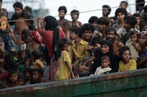 ArchambaultRohingya migrants stand and sit on a boat drifting in Thai waters off the southern island of Koh Lipe in the Andaman sea on May 14, 2015 Business Insider
